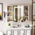 Pour un interieur harmonieux, bibliotheque avec etageres, avec elements vitres en finition vert
